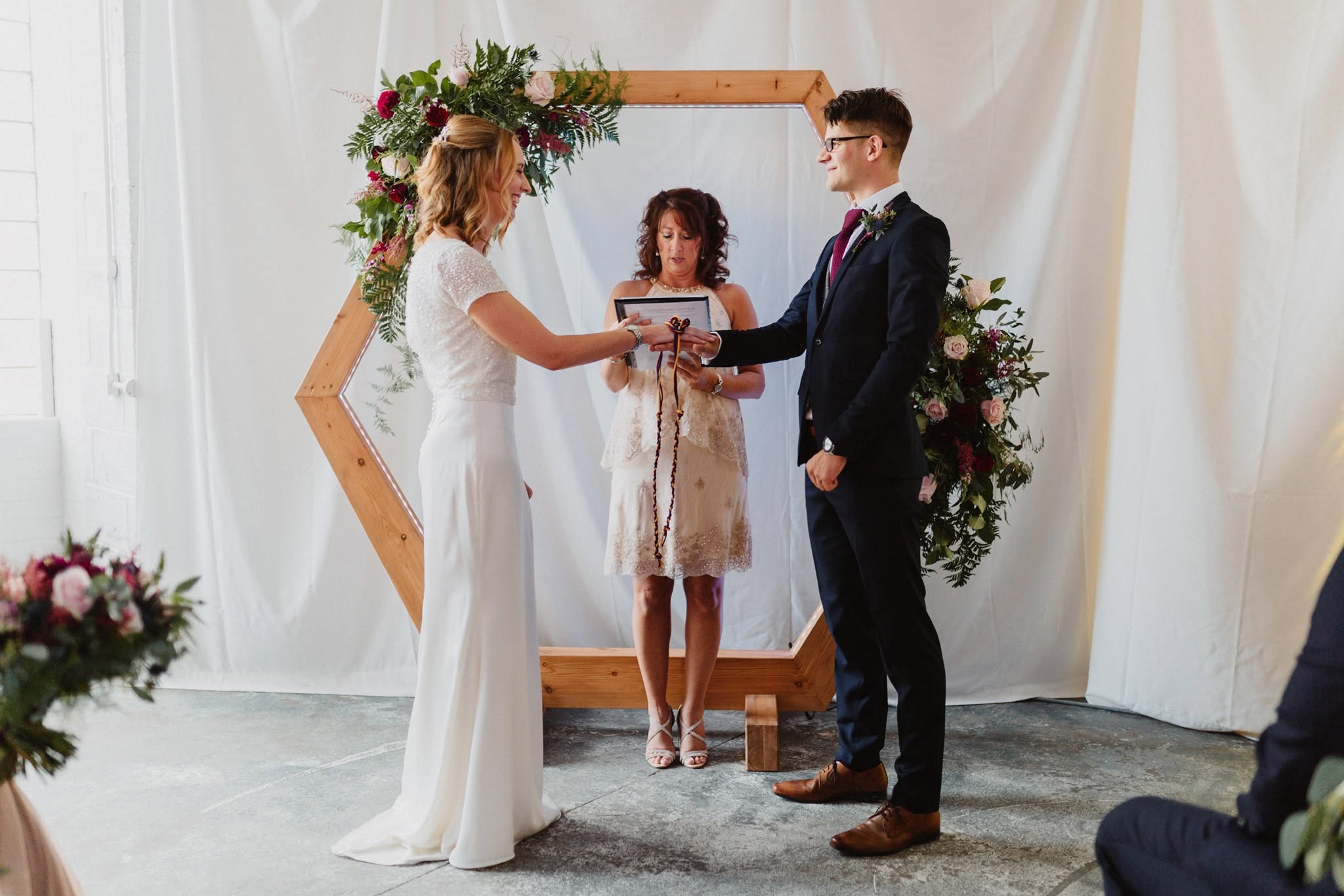 Rebecca with a newlywed couple